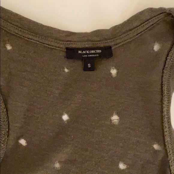 Distressed tank - Picture 4 of 4